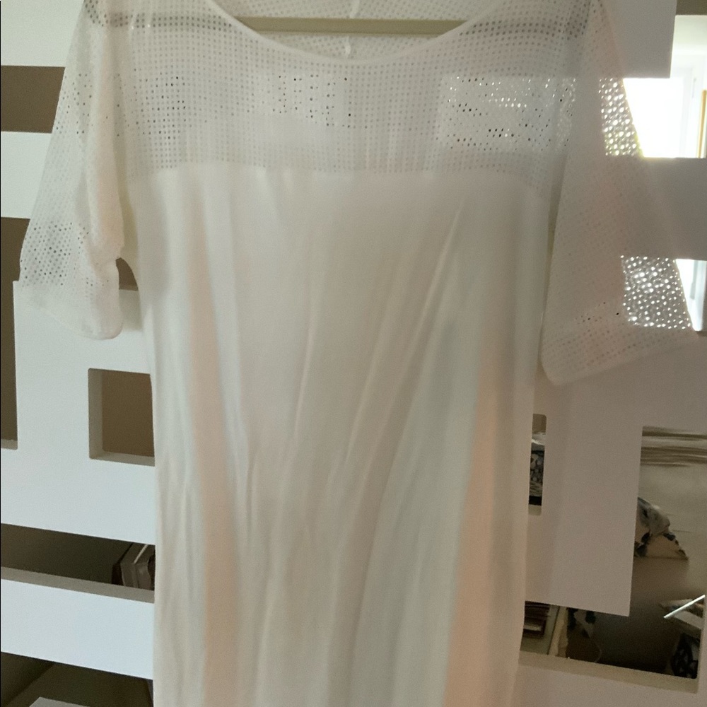 Never worn knit dress with mesh detail top, sleeves and bottom of hem